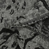 Jacquard de laine mélangée érosion animale noir et gris