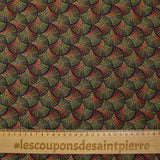 Peacock printed viscose in red, yellow and green dotted black background