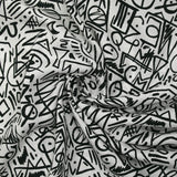 Viscose imprimée graffitis noir fond blanc