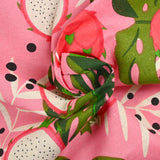 Polycotton printed monstera and dragon fruit pink background