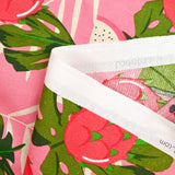 Polycotton printed monstera and dragon fruit pink background