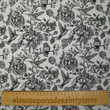 Viscose printed with roses and hummingbirds on a light gray background