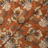 Viscose imprimée chrysanthèmes fond orange brûlé