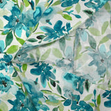 Viscose imprimée fleurs en aquarelle turquoise et vert fond blanc