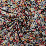 Viscose printed with bluish gray heather and wine lee black background