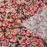 Viscose printed with raspberry heather and yellow black background