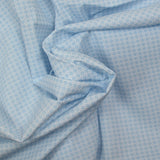 Coton imprimé minis pois ciel fond blanc