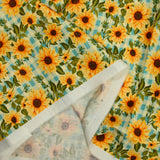 Coton imprimé tournesol fond vichy bleu