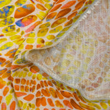 Lin viscose imprimé écailles ensoleillées orange et jaune fond écru