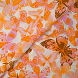Viscose printed jacquard butterflies lilac and orange white background