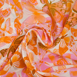 Viscose printed jacquard butterflies lilac and orange white background