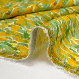 Lin viscose imprimé taches de peinture vert et jaune fond blanc