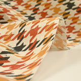 Polycotton camel and brown houndstooth print