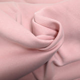 Tissu sweat minkee épais rose poudré