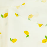 Coton imprimé citron jaune fond blanc