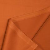 Orange buffed cotton poplin burned