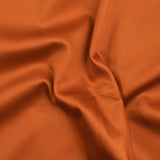 Orange buffed cotton poplin burned