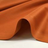 Orange buffed cotton poplin burned