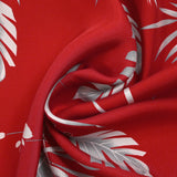 Twill de viscose imprimé Hawaii fond rouge fraise