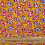 Coton imprimé ethnique Kampen fuchsia et turquoise fond jaune