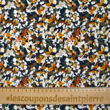 Viscosa estampada con flores de Ornella en naranja quemado, pato y azul marino
