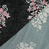 Maille de viscose satinée imprimé pois et fleurs fond noir