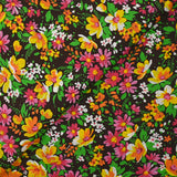 Coton imprimé vent floral orange et fuchsia fond marron