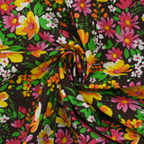 Coton imprimé vent floral orange et fuchsia fond marron