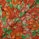 Coton imprimé constellation florale orange