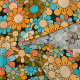 Coton imprimé flower power marron fond noir