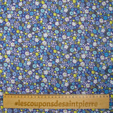 Cotton printed meadow in flowers blue indigo background