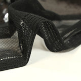 Black sequins on stretch tulle