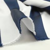 Navy and white striped silk-blend satin