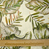 Natural printed viscose in green leaves on an ecru background