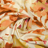 Viscose imprimée encre de fleurs orange et jaune fond écru