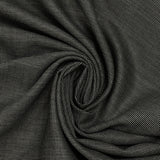 Light gray fantasy wool blend suit fabric with black background