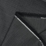 Tissu tailleur lin et laine mélangée pointillé blanc et gris fond noir