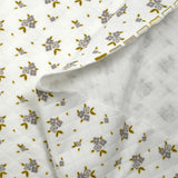 Jersey de coton matelassé imprimé fleurettes gris fond blanc