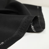 Intense black checkered wool blend suit fabric