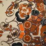 Jersey de viscose imprimé champ de fleurs orange et marron fond beige