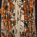 Jersey de viscose imprimé champ de fleurs orange et marron fond beige