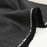 Tissu tailleur lin et laine mélangée pointillé blanc et gris fond noir