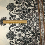 Cashmere printed polyester satin in anthracite frieze with ecru background