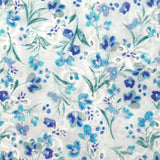 Broderie anglaise imprimée petites fleurs bleu fond blanc
