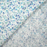 Broderie anglaise imprimée petites fleurs bleu fond blanc