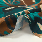 Polyester satin printed with brown and duck blue cashmere vibes