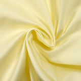 Popeline de coton satinée jaune beurre