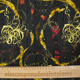 Mousseline imprimée bande satin chaînes et glands fond noir