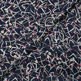 Mousseline imprimée bande satin fleurs vagabondes fond marine