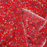 Crinkle chiffon printed iridescent daisy red background